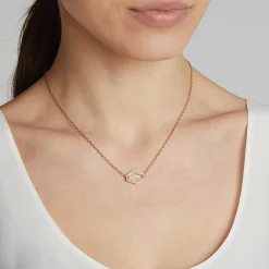 BELL 18K AND DIAMOND ELONGATED HEXAGONAL ROCK CRYSTAL PENDANT