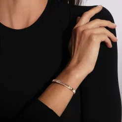 CLIVE 18K GOLD FLUTED BANGLE BRACELET WITH ORIGAMI PUSH CLOSURE