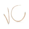 THOBY 18K AND SINGLE DIAMOND TUBULAR HOOP EARRING
